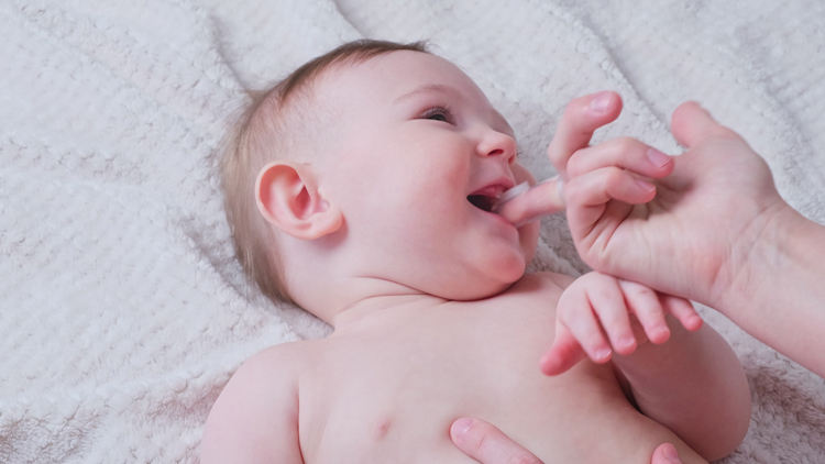 Baby teething with teething ring