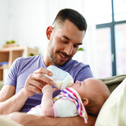 dad bottle feeding